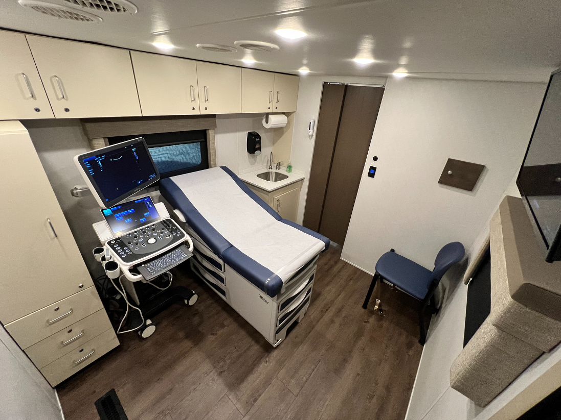 A woman researching the benefits of our mobile medical units